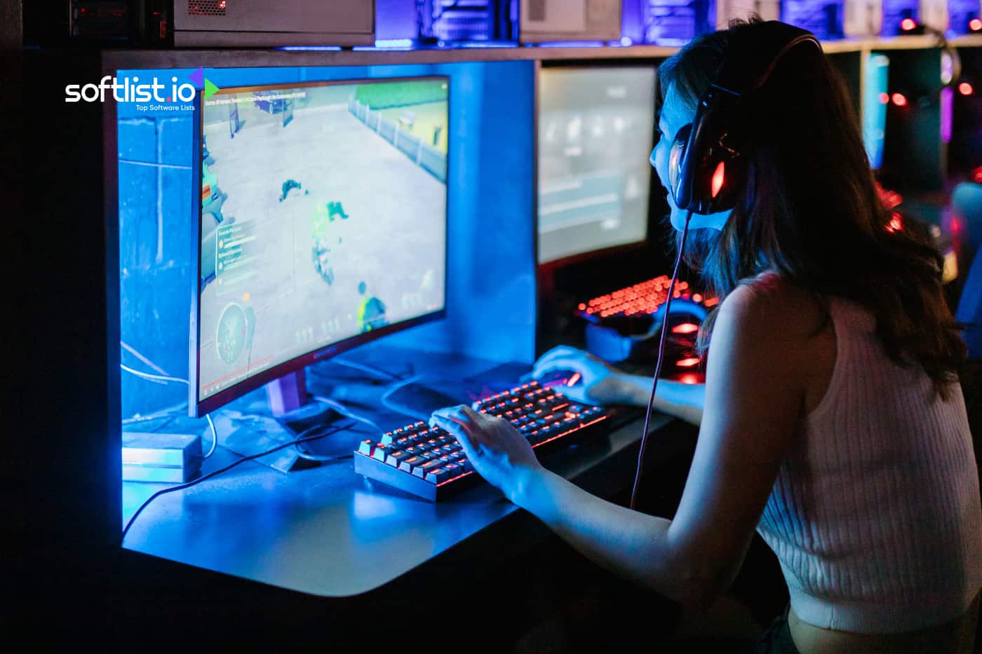 a female gamer playing on a computer