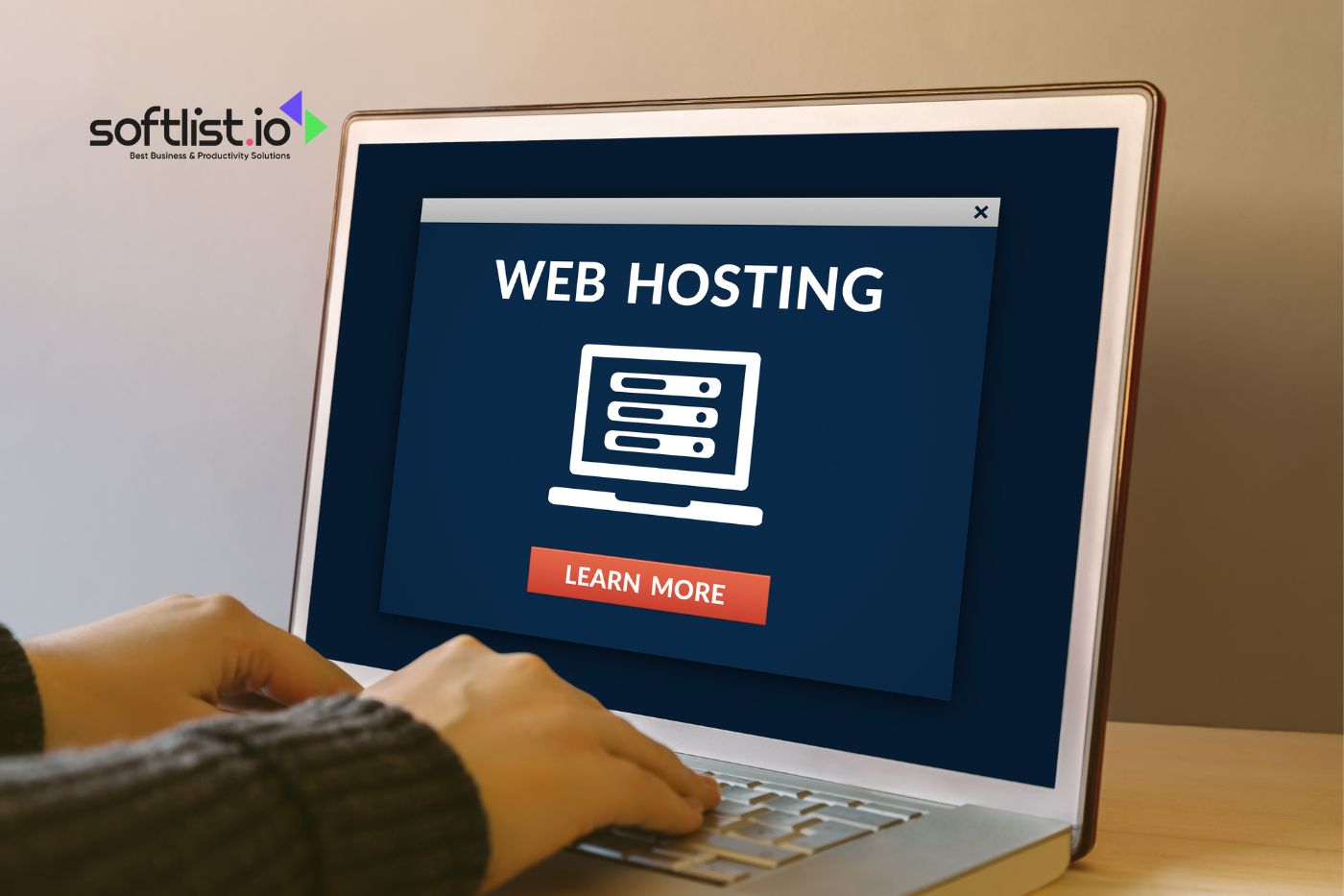 Computer screen displaying 'Web Hosting' with a call-to-action button, to learn more