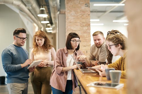 Free Shallow Focus Photo of People Discussing Stock Photo