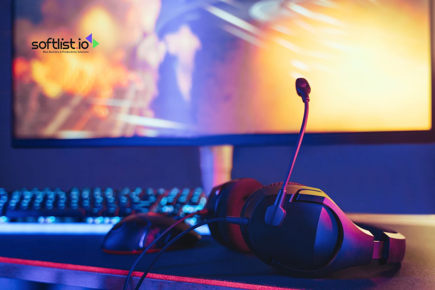 Gaming headset and keyboard setup with colorful lighting at a computer station.