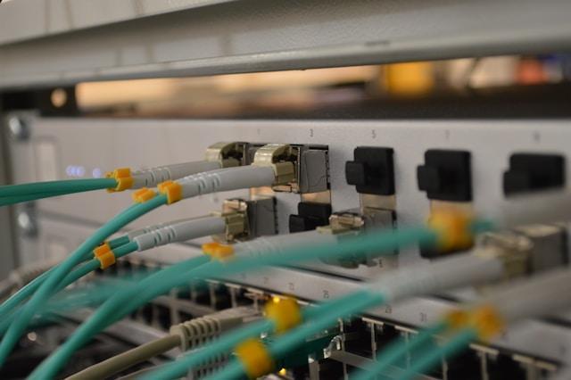 Network cables connected to a server rack