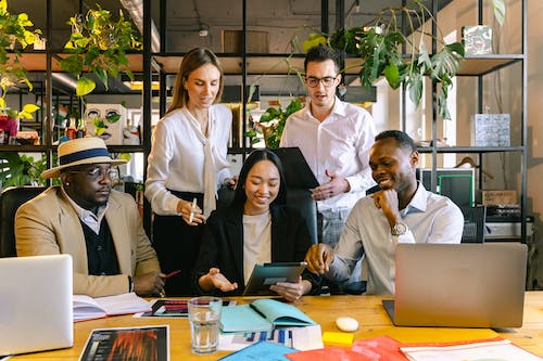 Free People in the Office Having a Meeting Stock Photo