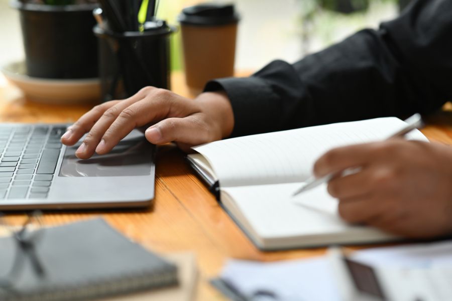 A person using a mouse on a computer